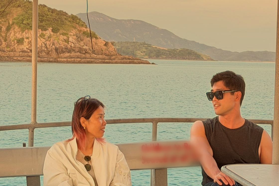 Guests on the open deck off Lindeman Island
